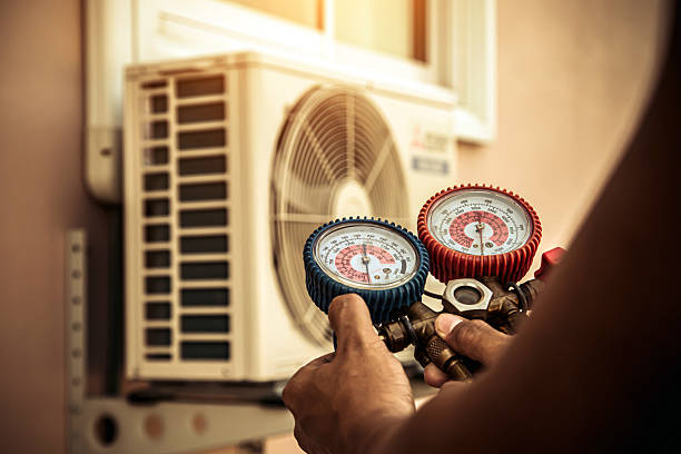 Professional Air Conditioning Service technician working in Sun City Center, FL